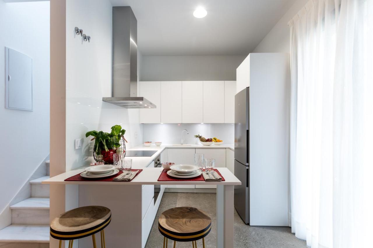 Apartamentos Rg Plaza De Espana Севилья Экстерьер фото